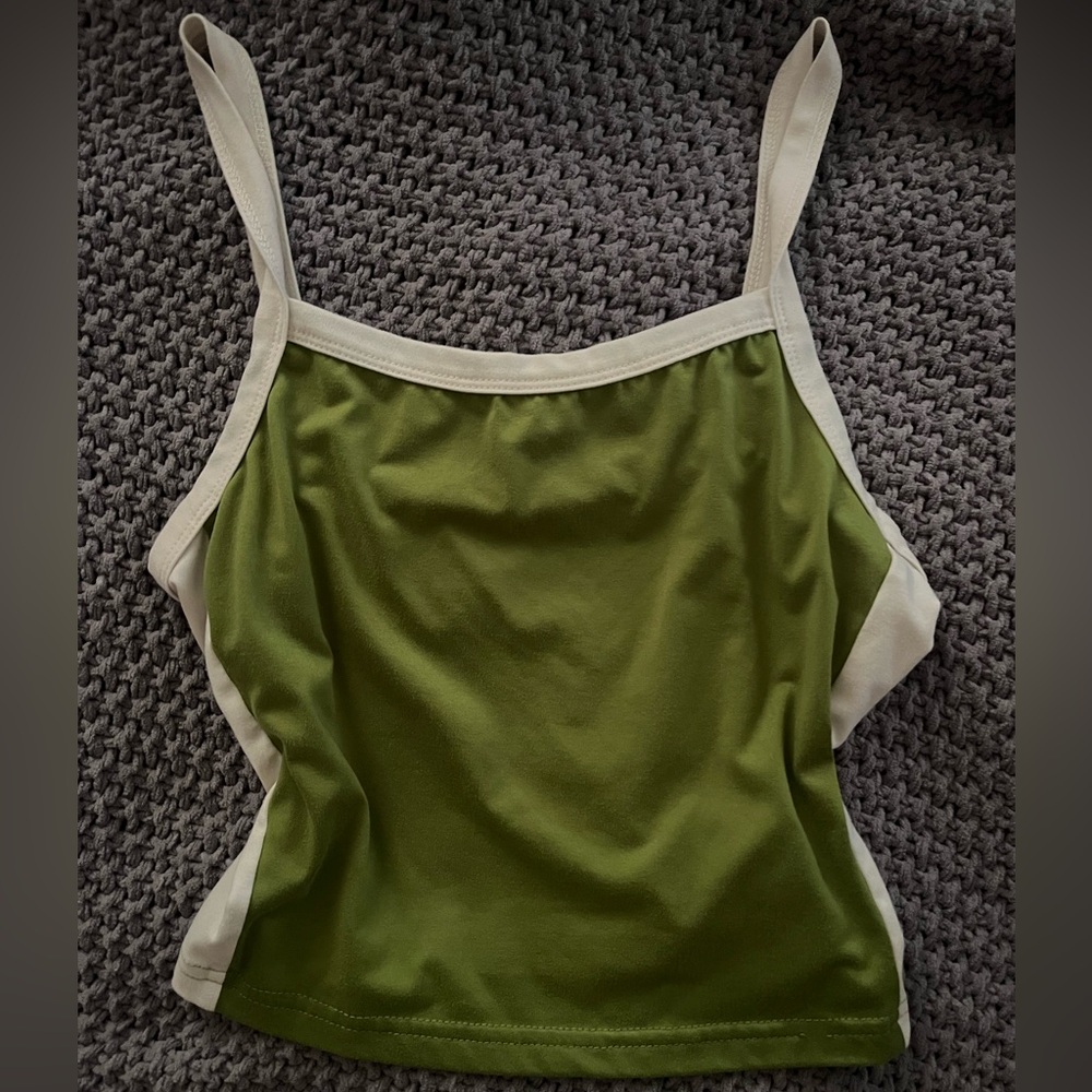 Green cropped tank top with white stripe on the side